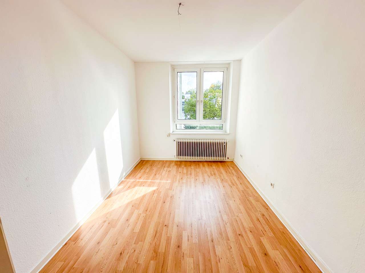 Renommiertes Wohn- und Geschäftshaus in 1A-Innenstadtlage –3 Wohnungen, langfristige Gewerbeeinheit